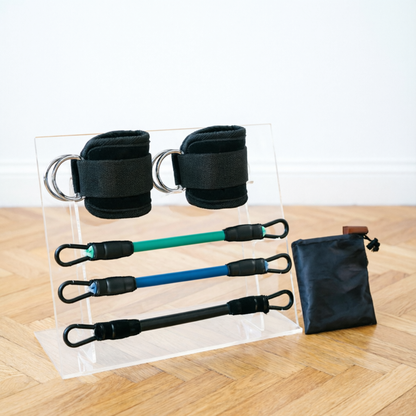 Élastique musculation noir brassards chevilles, trois résistances et pochette assortie.