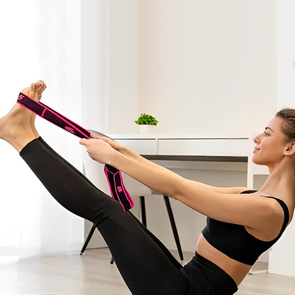 Femme en pont avec élastique musculation pour exercice jambes tendues.