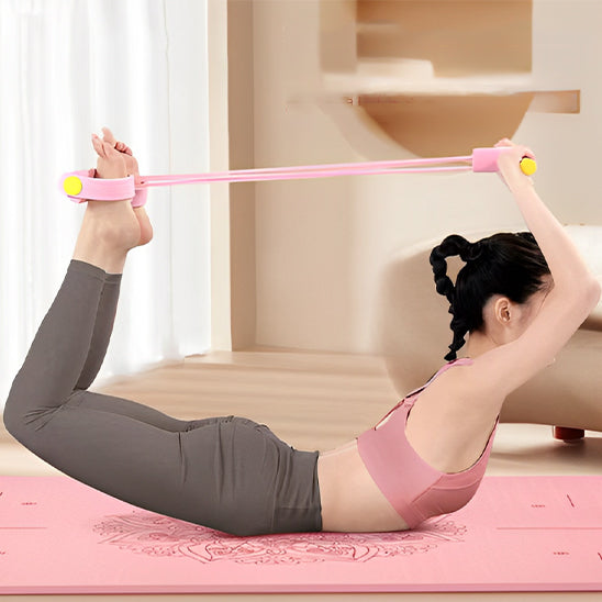 Femme en position d’arc utilisant un Élastique musculation rose