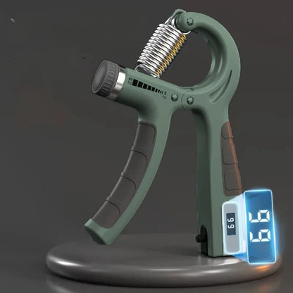 Hand grip vert sur socle, avec compteur numérique bleu lumineux.